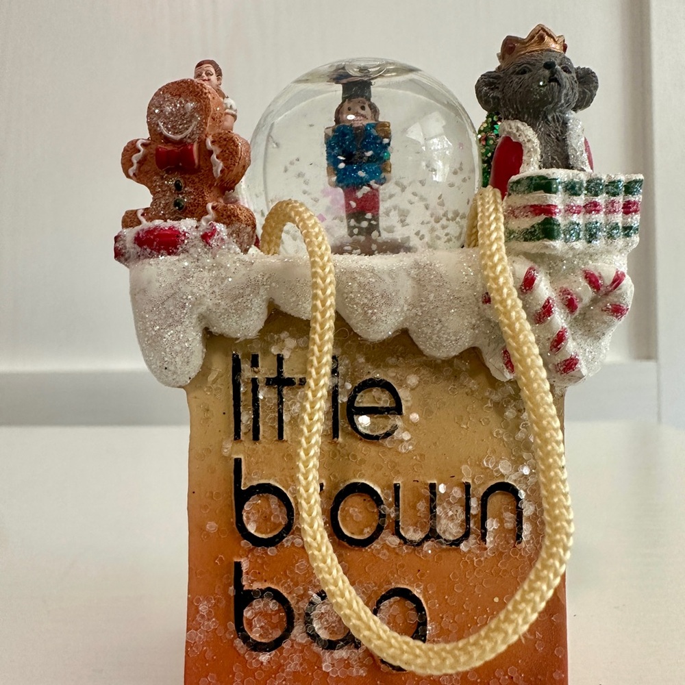 Bloomingdale’s Little Brown Bag Snow Globe Ornament feat Nutcracker